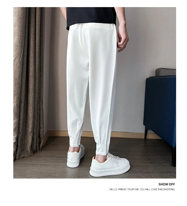 Pantaloni casual primavera/estate a tinta unita per uomo, pantaloni in seta ghiacciata, stile coreano, pantaloni eleganti con cerniera sulla caviglia, pantaloni per uomo.