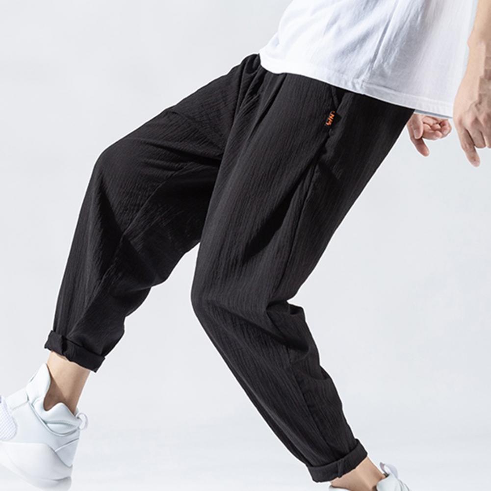 Pantaloni da uomo in cotone e lino larghi in stile giapponese, nuovi pantaloni in lino traspiranti per l'estate, pantaloni a tinta unita, streetwear fitness, taglia plus M-3XL.