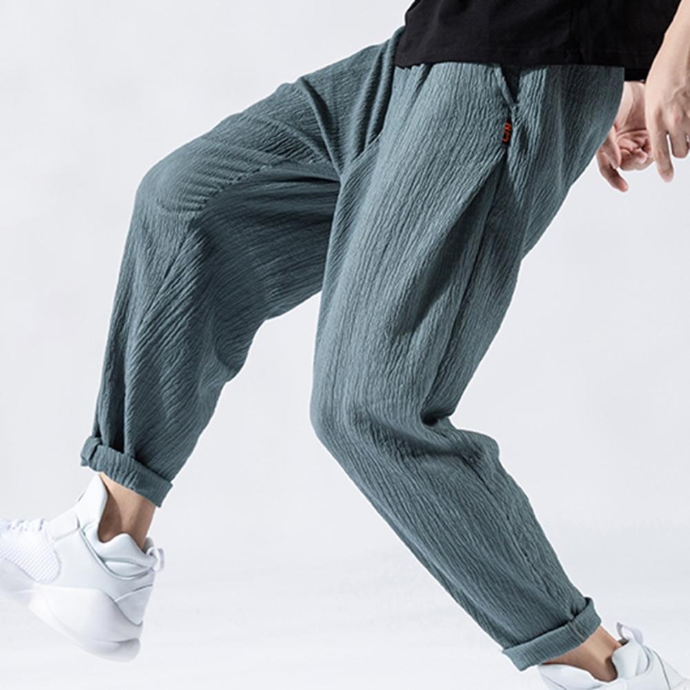 Pantaloni da uomo in cotone e lino larghi in stile giapponese, nuovi pantaloni in lino traspiranti per l'estate, pantaloni a tinta unita, streetwear fitness, taglia plus M-3XL.