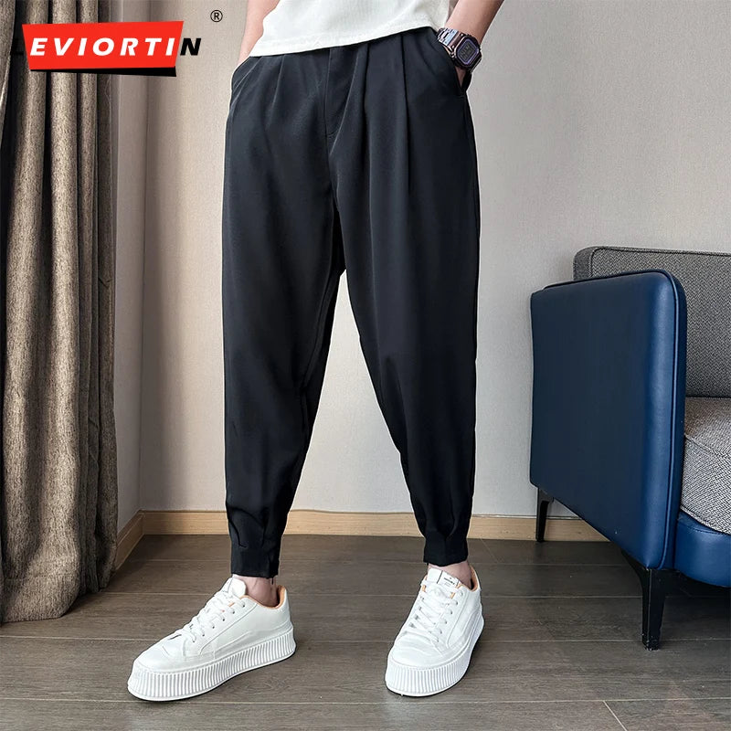 Pantaloni casual primavera/estate a tinta unita per uomo, pantaloni in seta ghiacciata, stile coreano, pantaloni eleganti con cerniera sulla caviglia, pantaloni per uomo.