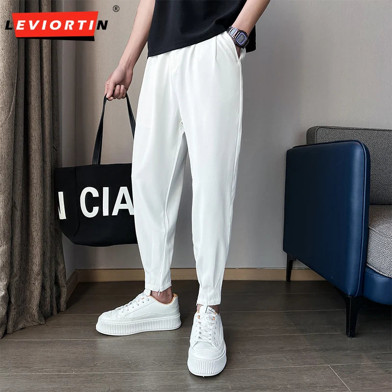 Pantaloni casual primavera/estate a tinta unita per uomo, pantaloni in seta ghiacciata, stile coreano, pantaloni eleganti con cerniera sulla caviglia, pantaloni per uomo.