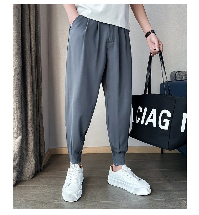 Pantaloni casual primavera/estate a tinta unita per uomo, pantaloni in seta ghiacciata, stile coreano, pantaloni eleganti con cerniera sulla caviglia, pantaloni per uomo.