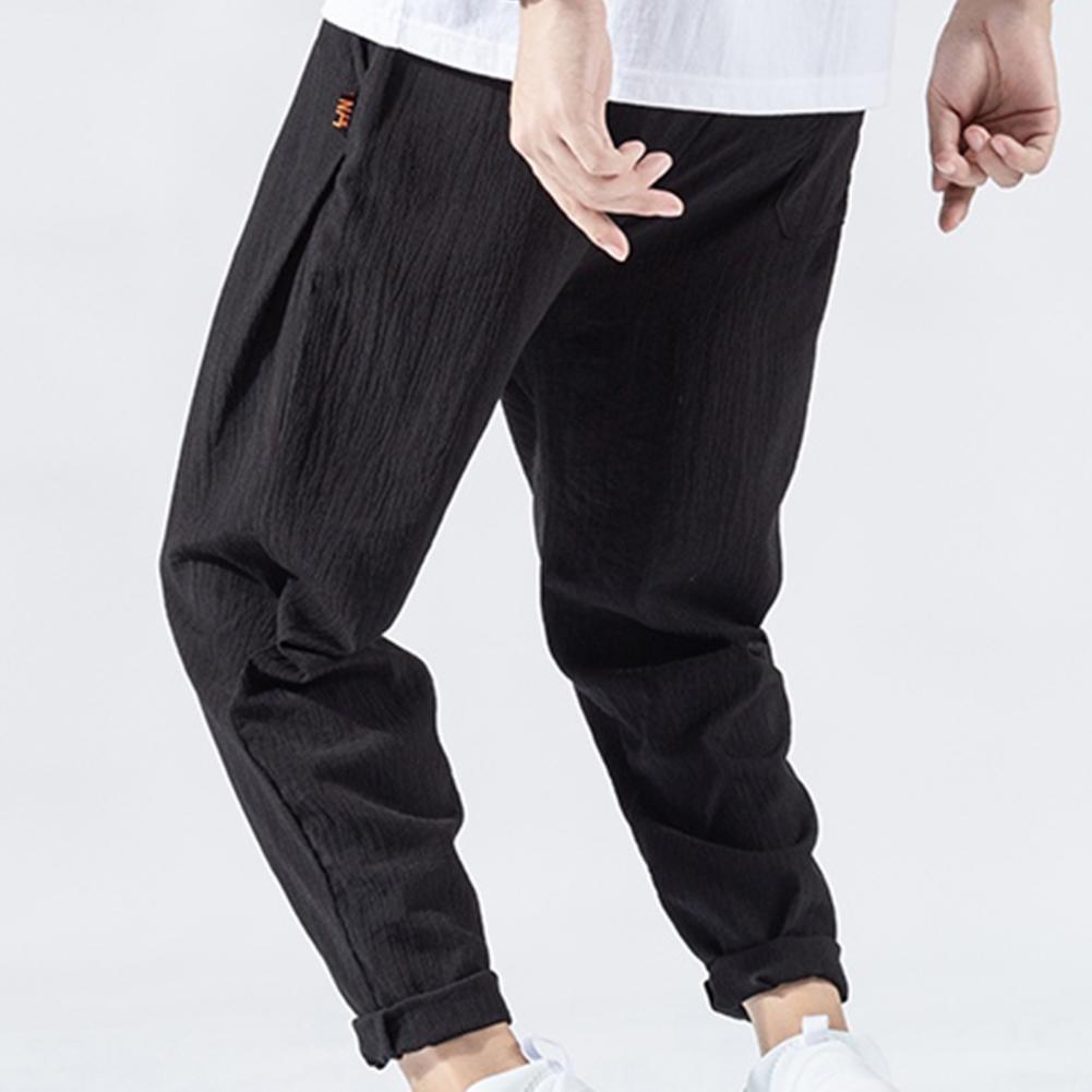 Pantaloni da uomo in cotone e lino larghi in stile giapponese, nuovi pantaloni in lino traspiranti per l'estate, pantaloni a tinta unita, streetwear fitness, taglia plus M-3XL.