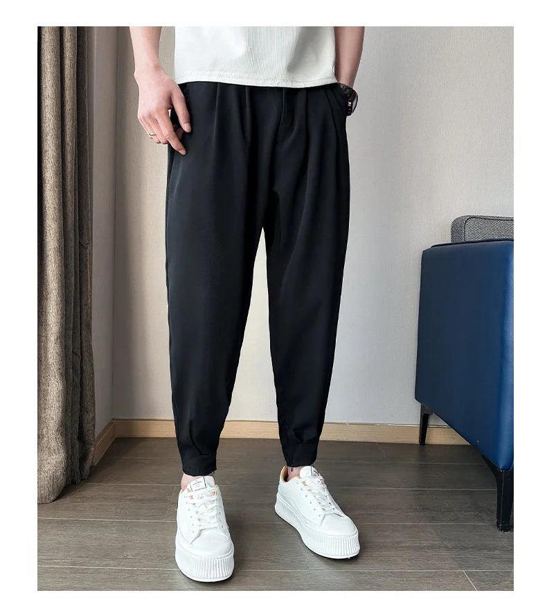 Pantaloni casual primavera/estate a tinta unita per uomo, pantaloni in seta ghiacciata, stile coreano, pantaloni eleganti con cerniera sulla caviglia, pantaloni per uomo.