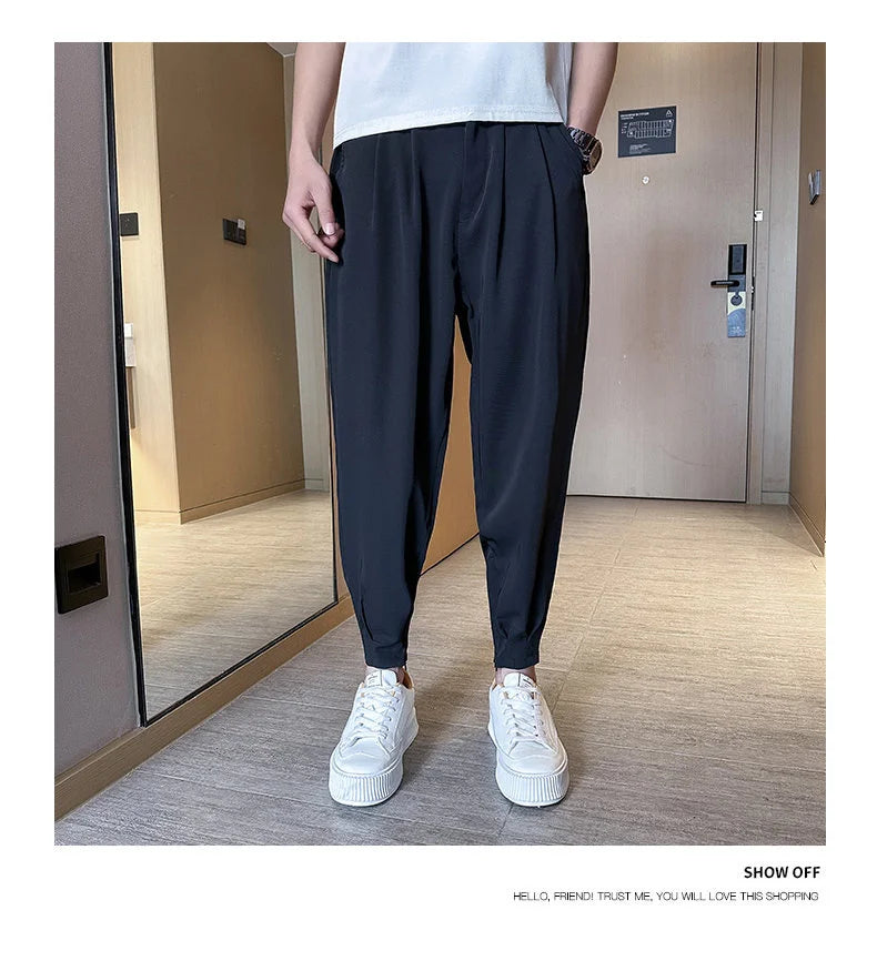 Pantaloni casual primavera/estate a tinta unita per uomo, pantaloni in seta ghiacciata, stile coreano, pantaloni eleganti con cerniera sulla caviglia, pantaloni per uomo.