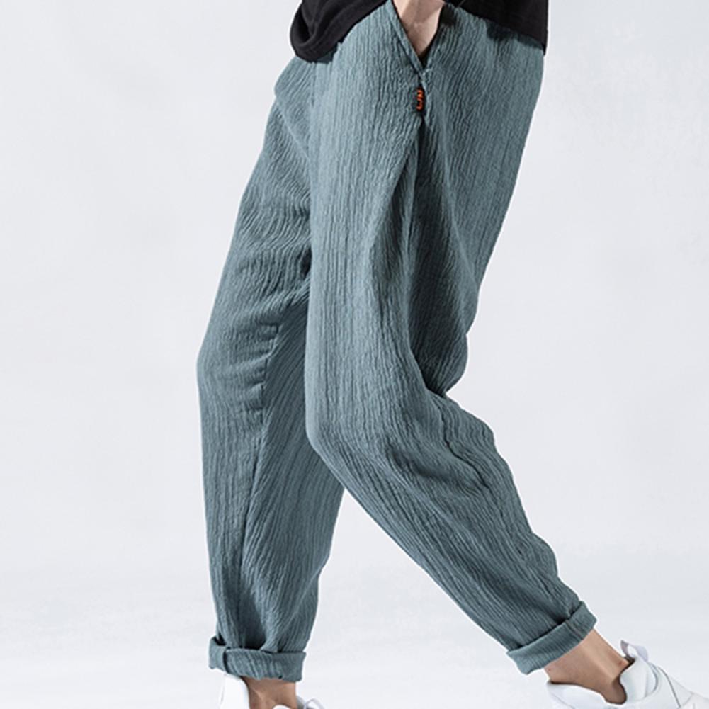 Pantaloni da uomo in cotone e lino larghi in stile giapponese, nuovi pantaloni in lino traspiranti per l'estate, pantaloni a tinta unita, streetwear fitness, taglia plus M-3XL.