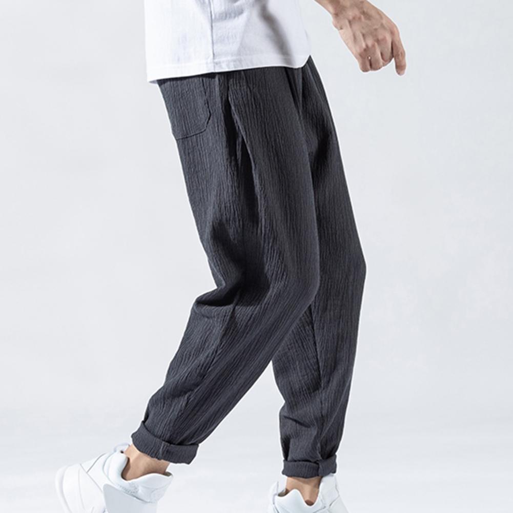 Pantaloni da uomo in cotone e lino larghi in stile giapponese, nuovi pantaloni in lino traspiranti per l'estate, pantaloni a tinta unita, streetwear fitness, taglia plus M-3XL.