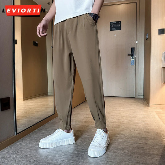 Pantaloni casual primavera/estate a tinta unita per uomo, pantaloni in seta ghiacciata, stile coreano, pantaloni eleganti con cerniera sulla caviglia, pantaloni per uomo.