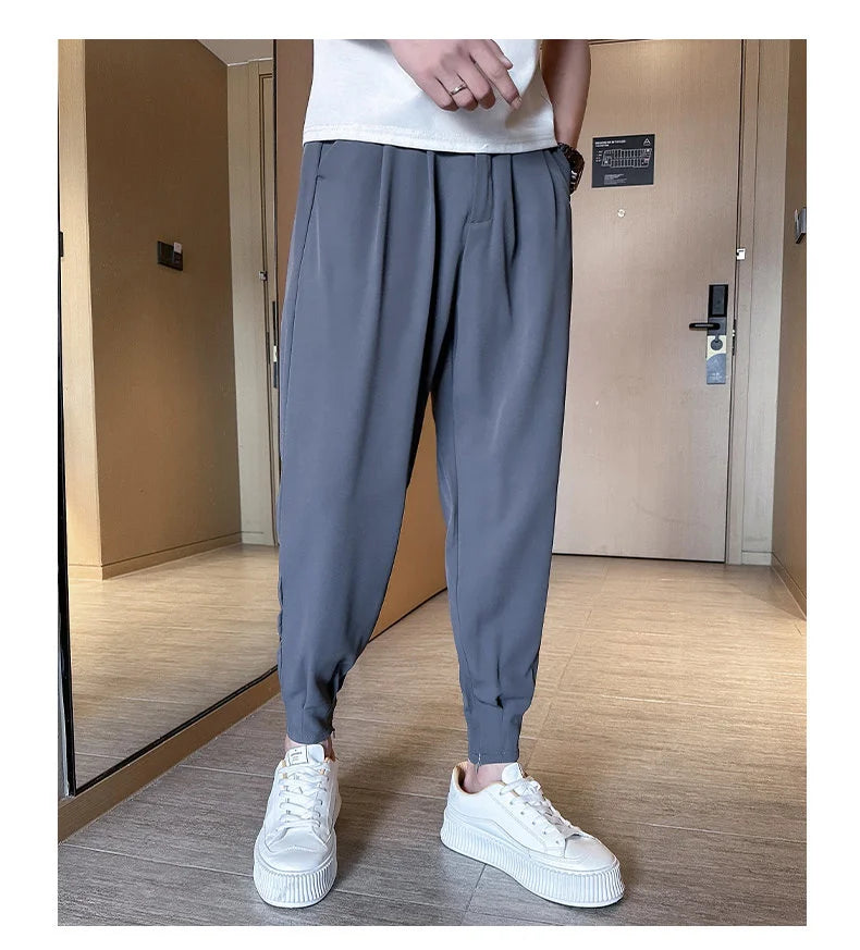 Pantaloni casual primavera/estate a tinta unita per uomo, pantaloni in seta ghiacciata, stile coreano, pantaloni eleganti con cerniera sulla caviglia, pantaloni per uomo.